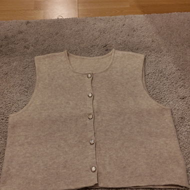 Gilet beige senza maniche