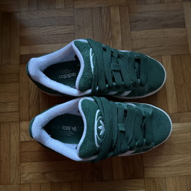 Pair of green adidas Campus sneakers