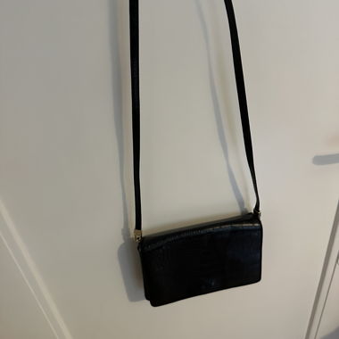 Schwarze Clutch