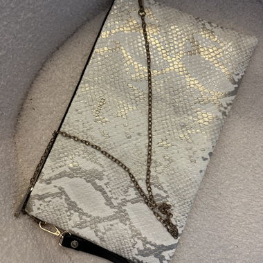 Tanca clutch con stampa serpente