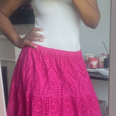 Gonna midi in rosa con occhielli