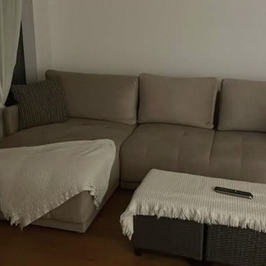 Beige corner sofa bed in bobochic style
