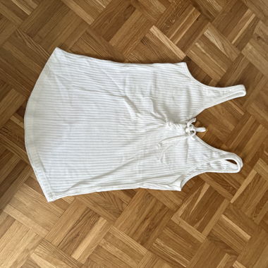 Top bianco a spalline con nodo