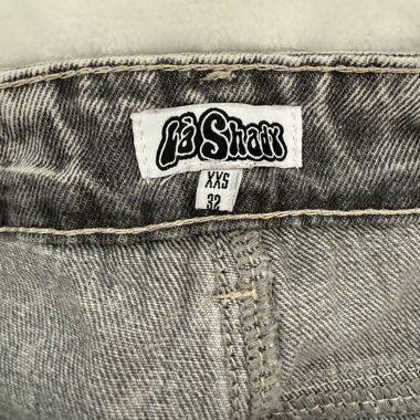 Jeans grigi a gamba ampia