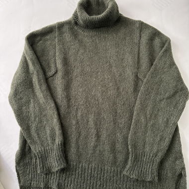 Pull col roulé vert en maille