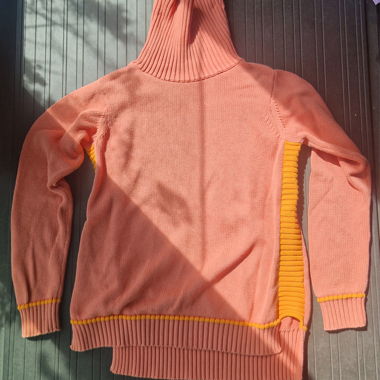SKFK, Maglione