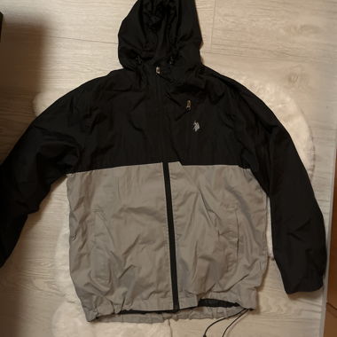 Black and grey hooded k-way