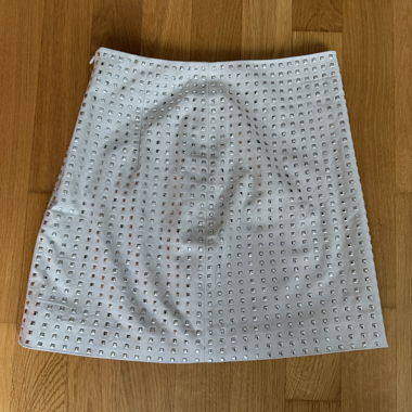 H&M beige mini skirt with silver studs