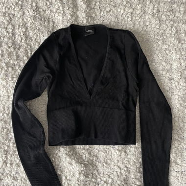 Top crop aderente a maniche lunghe