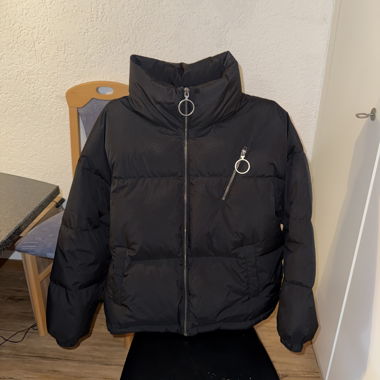 Schwarze Puffer Jacke