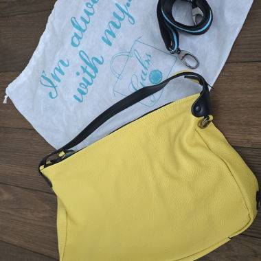 Yellow leather bag with shoulder strap