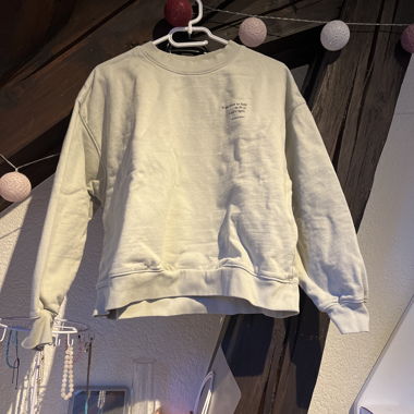 Felpa beige con messaggio minimal