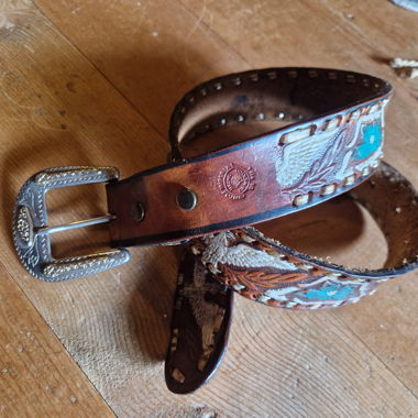 Decorated leather belt