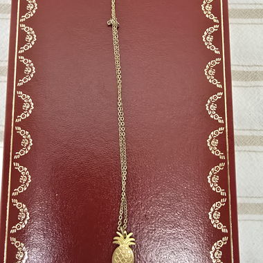 Gold-coloured pineapple necklace