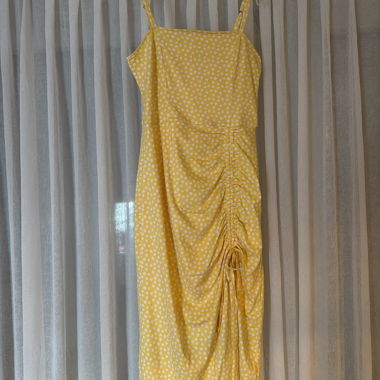 Yellow spaghetti-strap dress with floral pattern