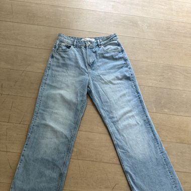 Lange hellblaue Hose 