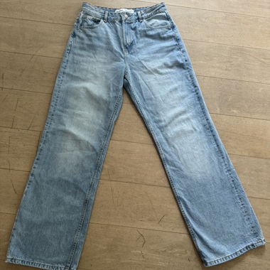 Lange hellblaue Hose 