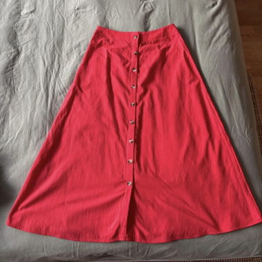 Gonna midi rosa con bottoni