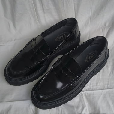 Pantofole Tod's in pelle platform da donna con morsetto penny