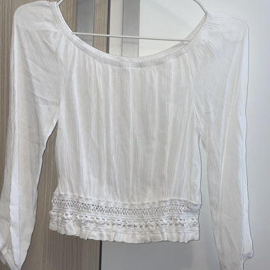 Blusa leggermente crop