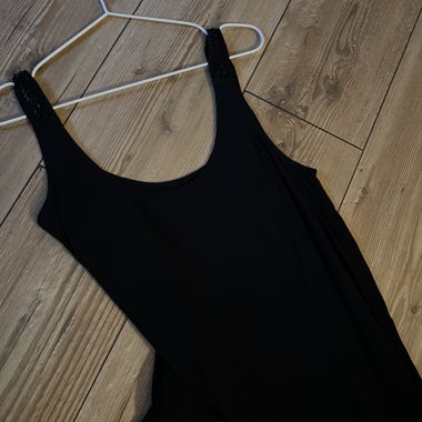 Schwarzes Top mit Glitzer Anteil