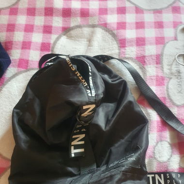 Rucksack schwarz mit weisser schrift
