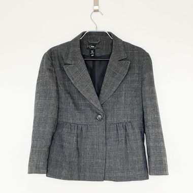 Blazer gris à carreaux avec basque