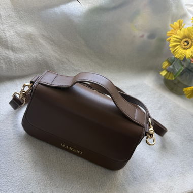 Brown crossbody bag by MAKANI