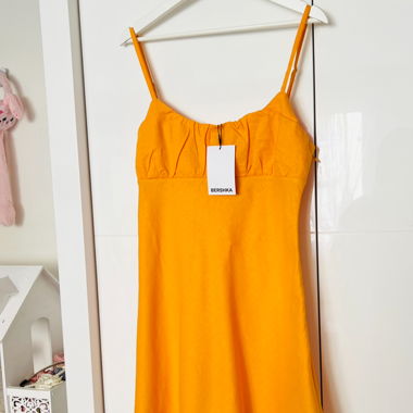 Intense orange dress from Bershka