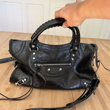 Black leather city style handbag