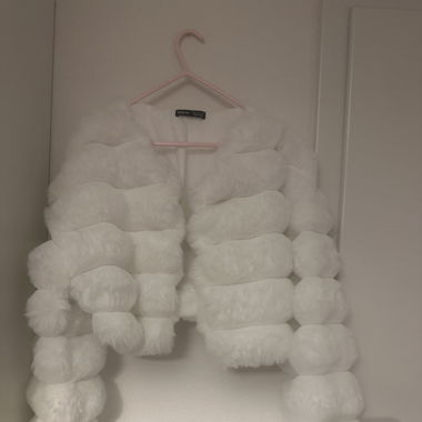 Fourrure courte blanche 