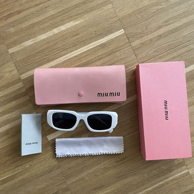 Occhiali da sole bianchi Miu Miu
