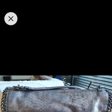belle  pochette  guess bandoulière détachable 