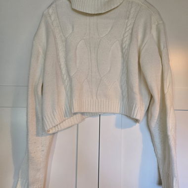 Maglione in maglia bianco con collo alto