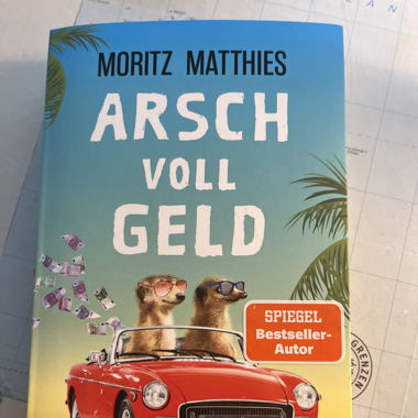 Buch Ar.. voll Geld