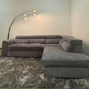 Corner sofa with storage and bed function