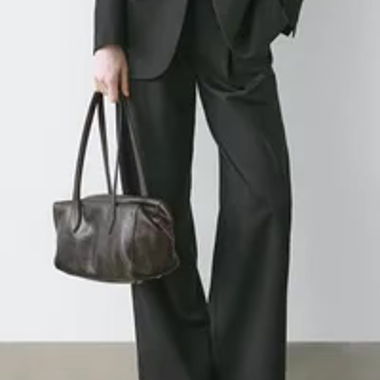 Schwarze weite Stoffhose