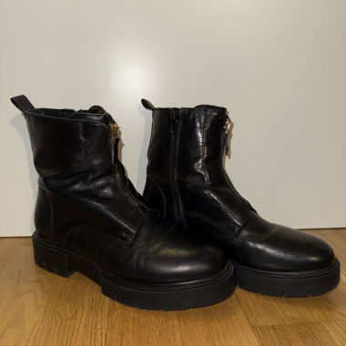 Black leather boots with zipper