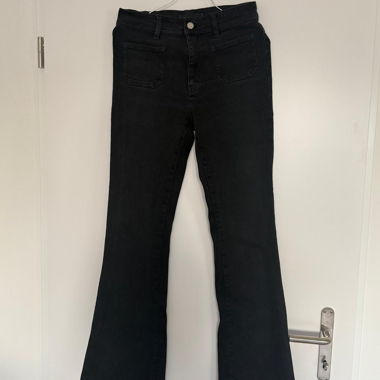 Jeans neri a campana