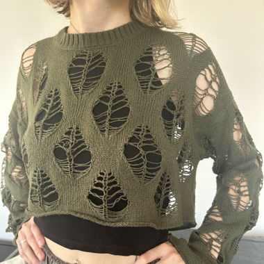 Etwas löchriger Pullover
