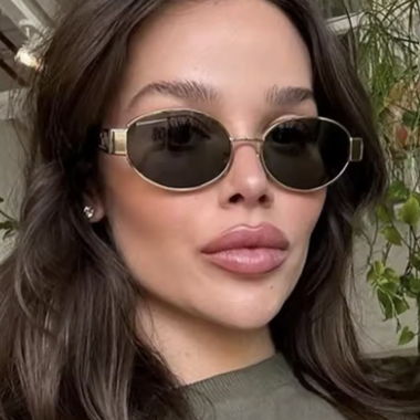 Goldene ovale Sonnenbrille