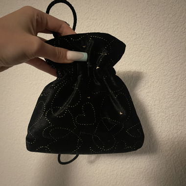 kleine schwarze Tasche