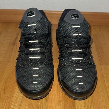 Schwarze Nike-Laufschuhe (TN Utility)