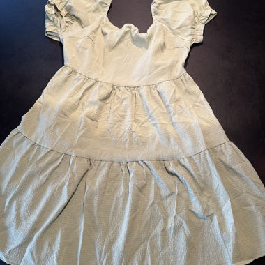 Light green short-sleeve dress with ruffles