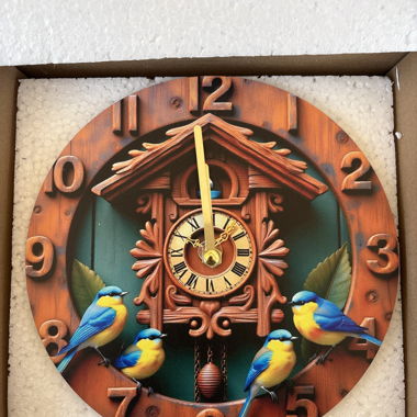 Orologio da parete con uccellini