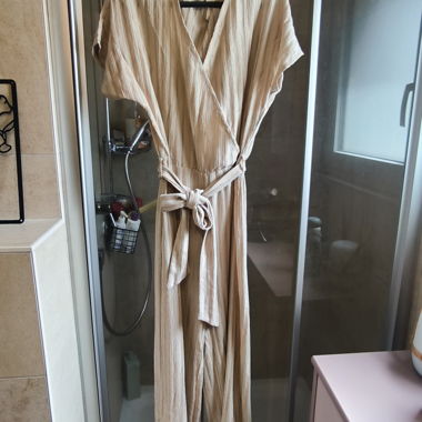 Salopette a righe beige