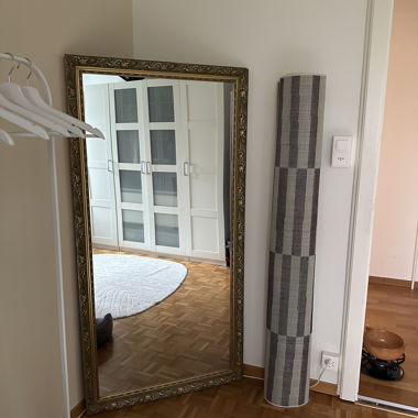Miroir mural doré