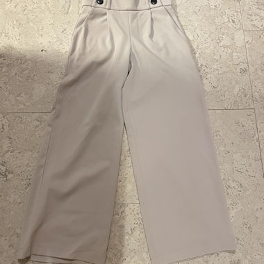 Pantaloni in tessuto beige