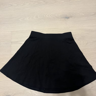 Black mini skirt with zipper in the back