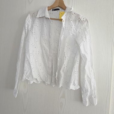 White eyelet blouse with long sleeves